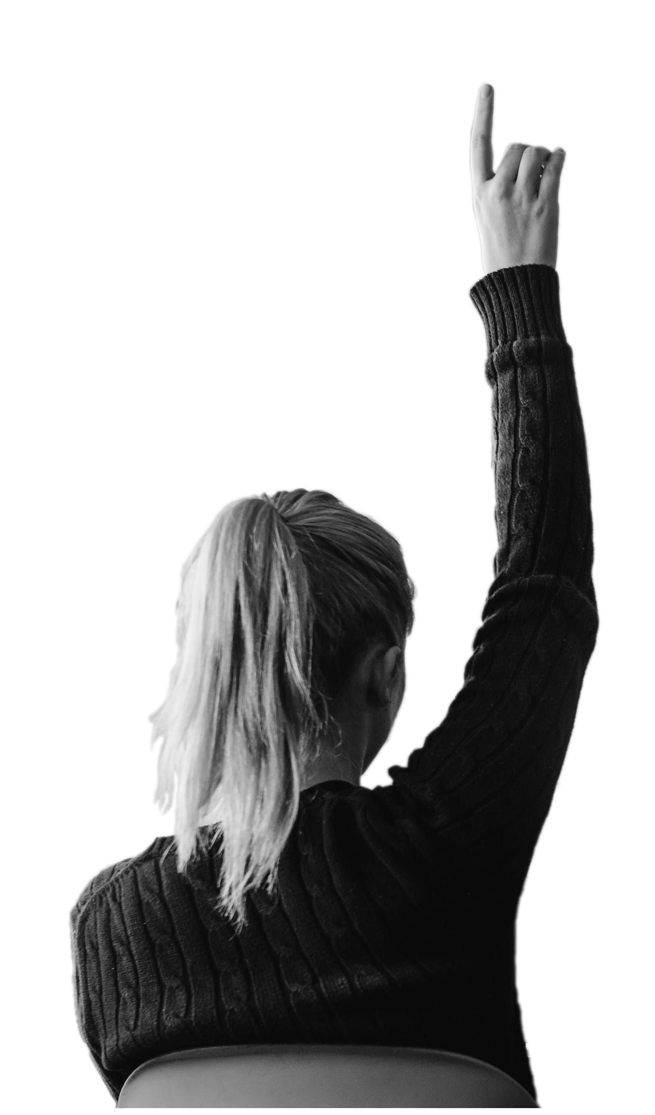 A girl with her hand raised