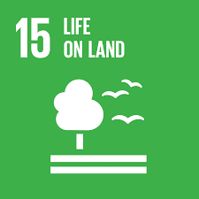 Global goal 15 - green backgroung with a tree and three birds flying past the tree all in white.