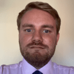 Jonathan Hill looks at the camera