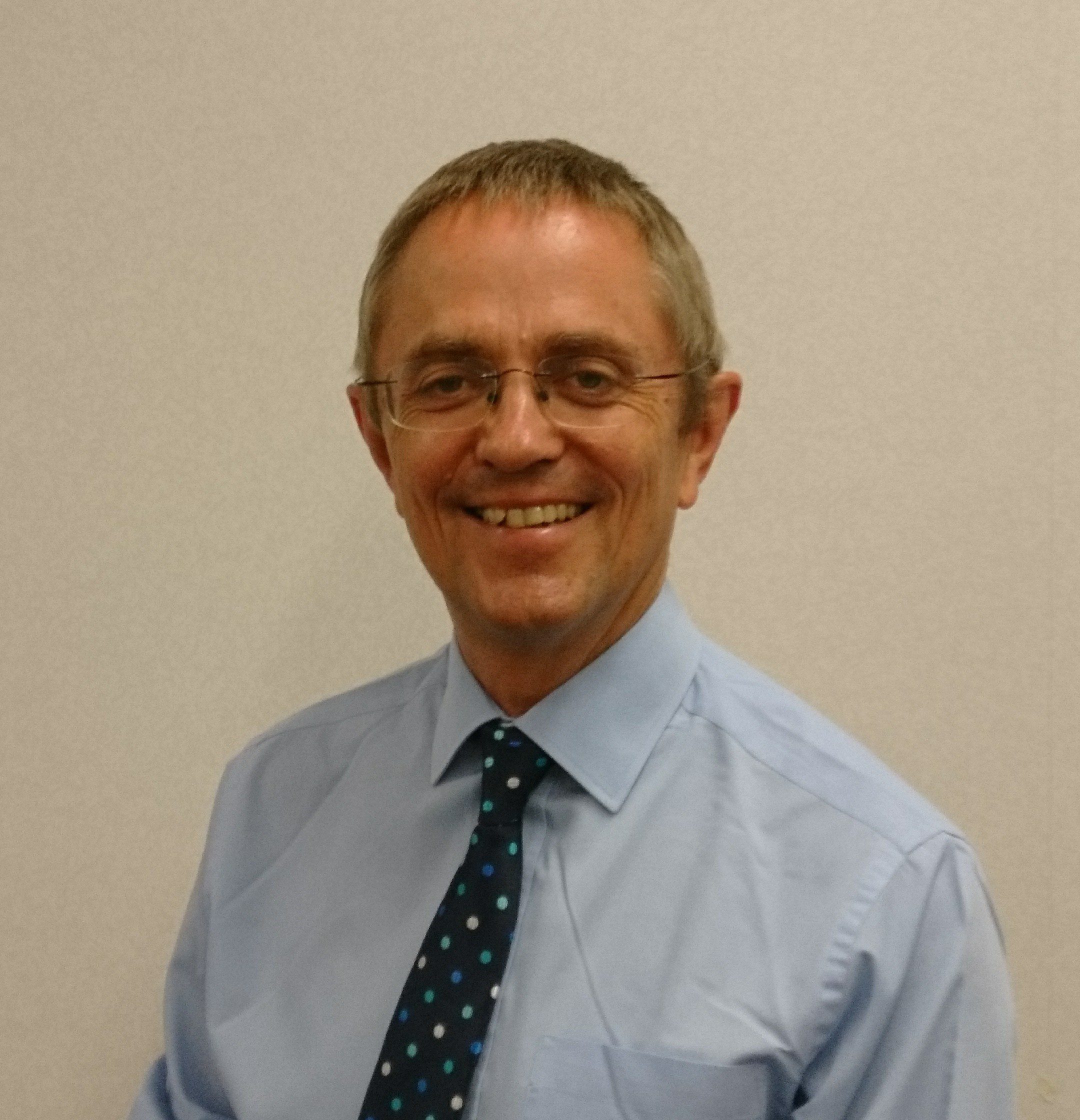Image of Dr Andy Rees smiling at the camera