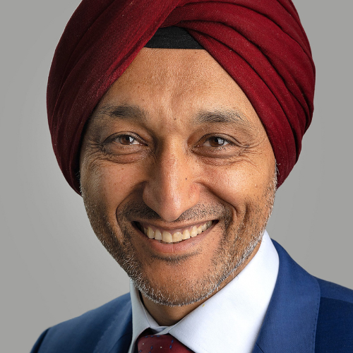 Parimder Kohil smiling at the camera