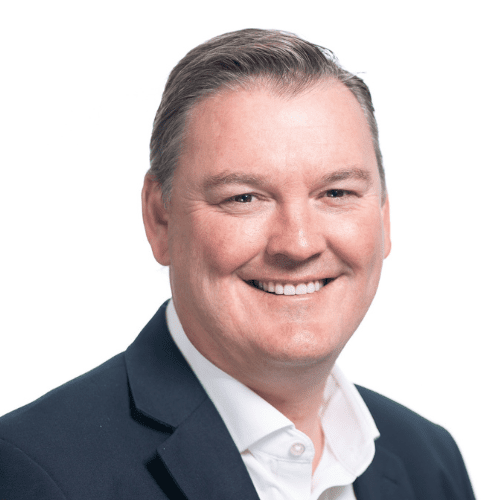 Richard Sykes smiling at the camera against a plain white background.